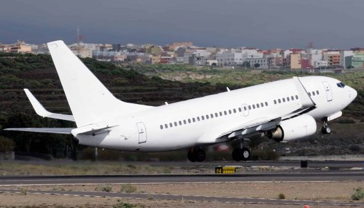 Modern airplane in Airport. Taking off on runway